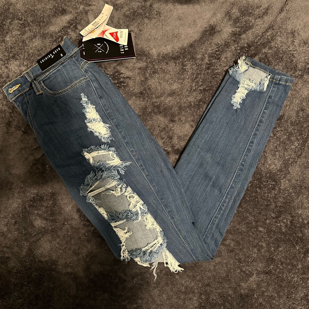 Distressed Blue Skinny Jeans - FashionNova